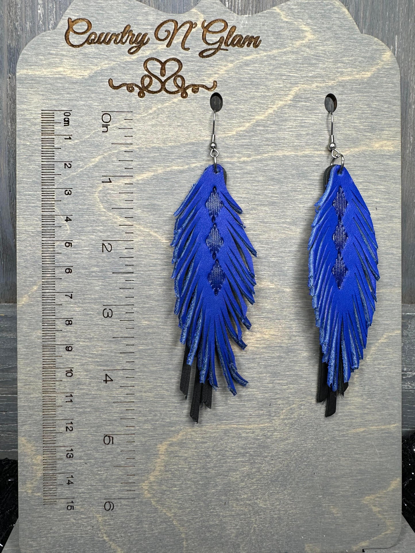Hand tooled western feathers Royal blue