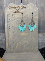 Aqua palm petals on silver chandelier drops