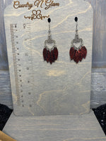 Shimmer red on black leather petals. Heart chandelier