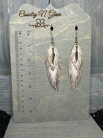 Metallic bronze hand painted Nikki’s with feather charm