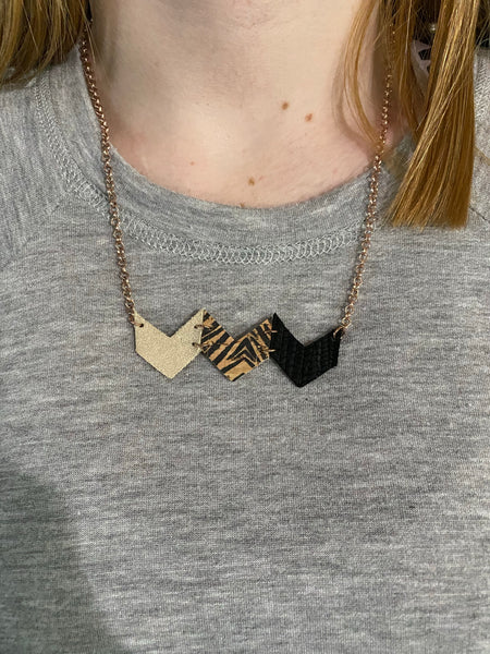 Tiger stripes, shimmer gold and black palm necklace