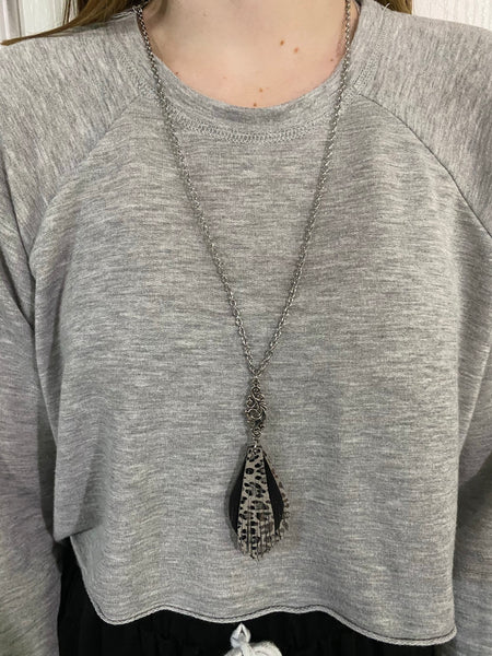 Metallic silver leopard with matte black necklace