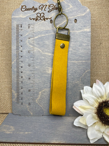 Mustard suede wristlet