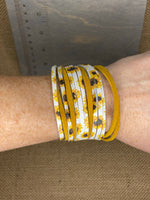 Sunflowers on white and mustard suede bracelet