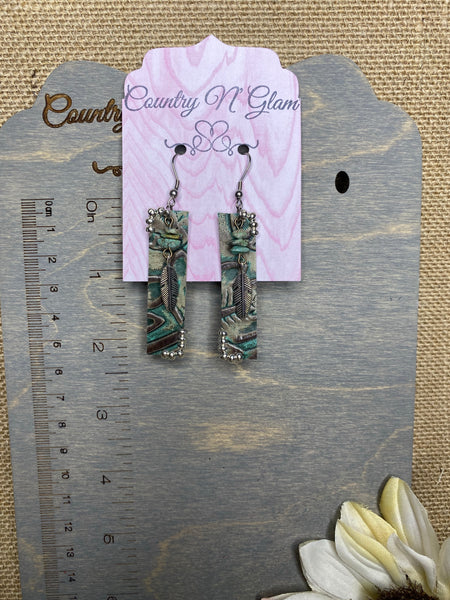 Texas rose tooled with African turquoise bars